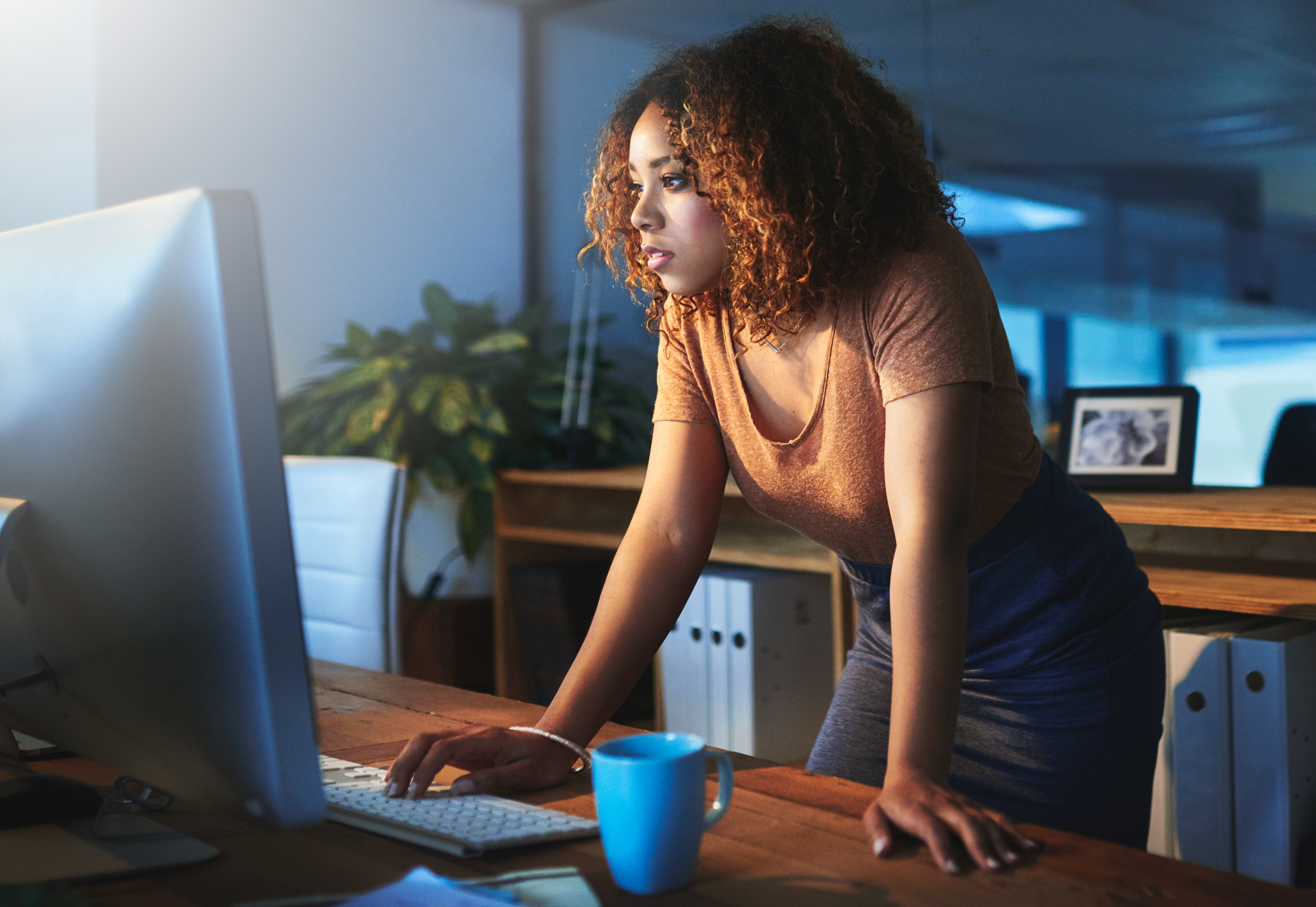 woman looking at computer